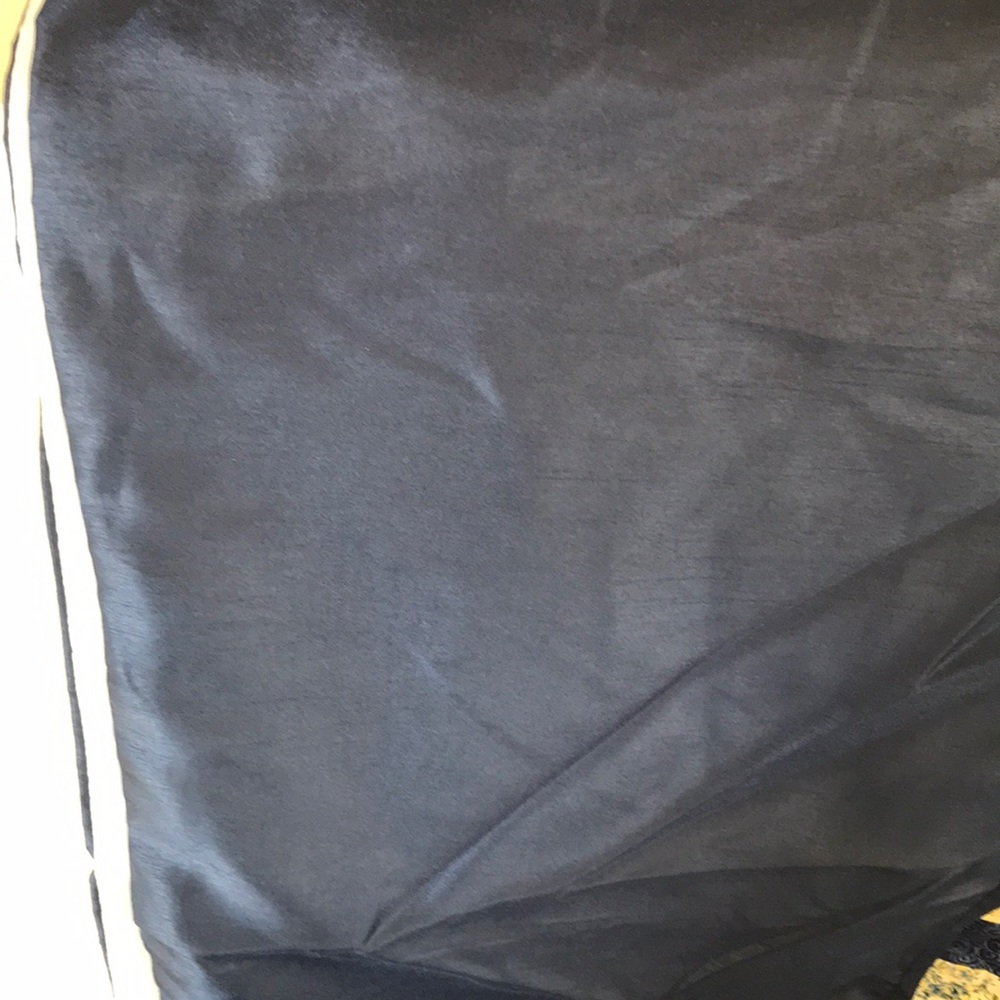 King sized.  Navy blue bed skirt.